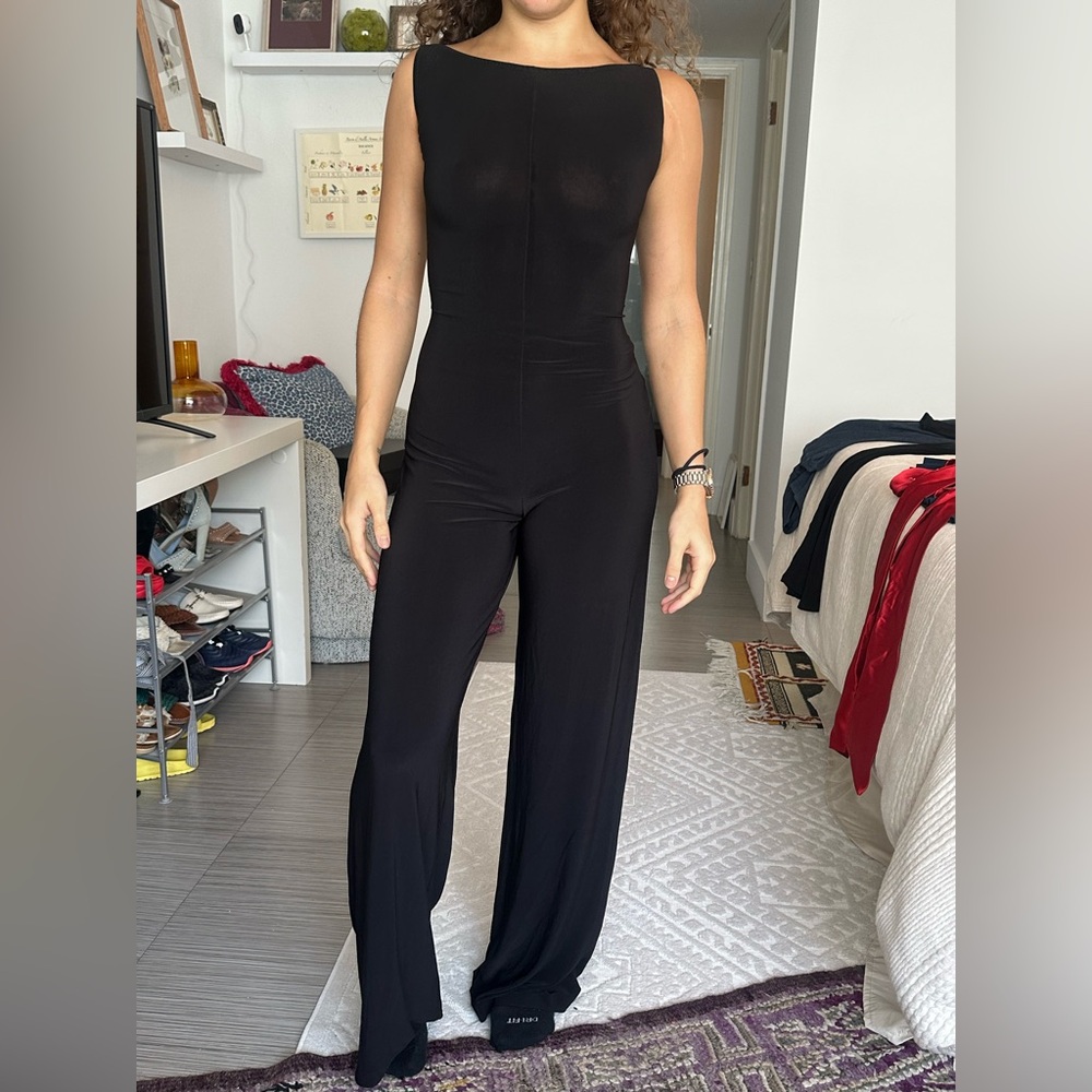 Norma Kamali black jump suit cross cross back